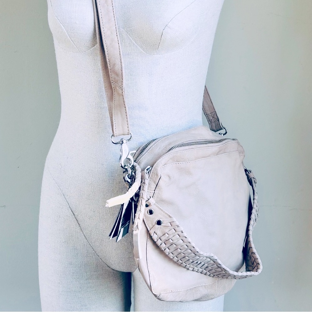 NWT genuine leather crossbody by Day & Mood. Minor ink markings as shown.